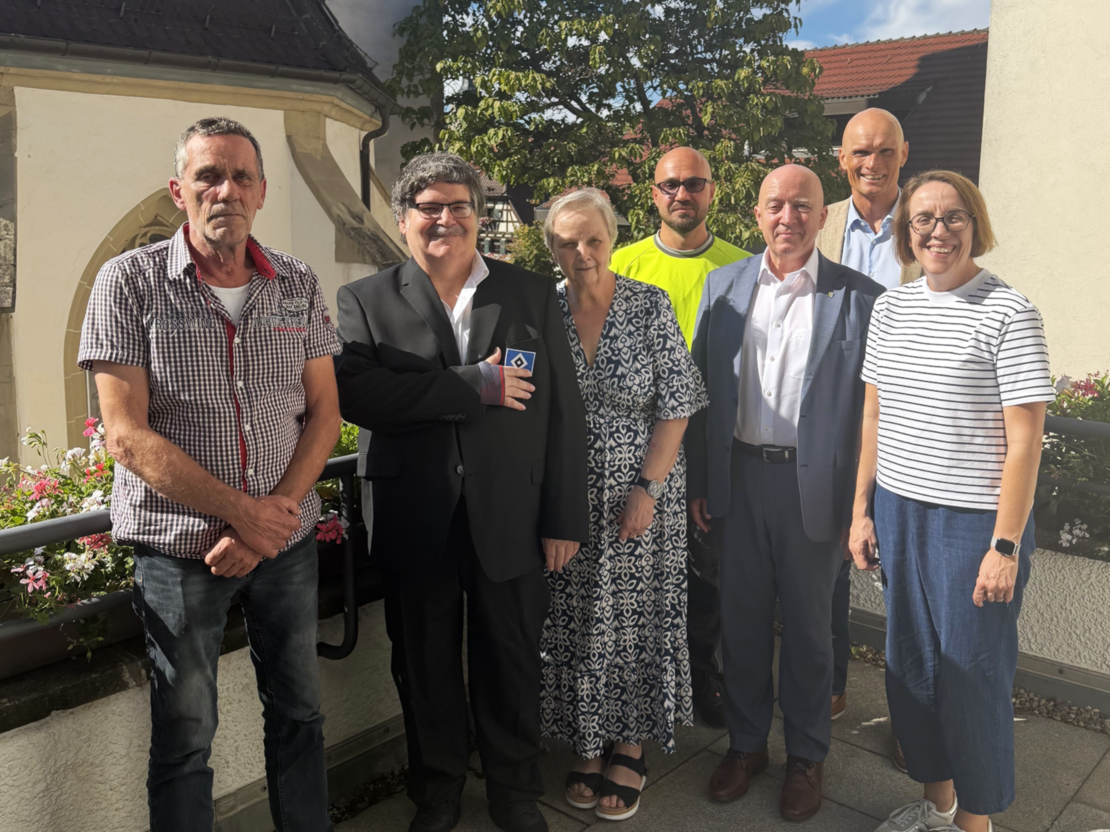 Gruppenfoto mit Thomas Zuber auf der Dachterrasse des OB-Büros.